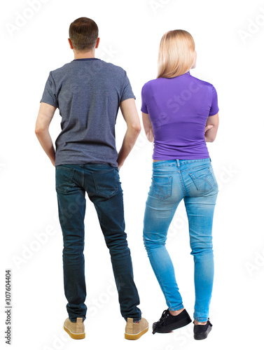 Back view of couple. beautiful friendly girl and guy together.