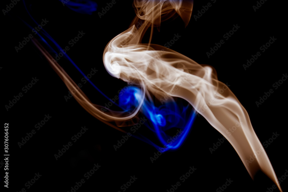 multicolored smoke photo aginst balck background multicolored smoke photo aginst balck background