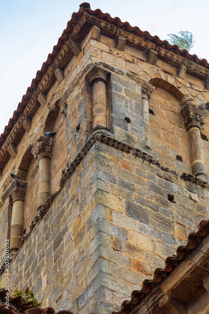 Close-up tower of the Collegiate Church of Santillana del Mar (Cantabria - Spain). Medieval village. Romanesque art of the twelfth century. Santiago's road