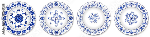 Set of blue porcelain plates, floral pattern with Chinese motives photo