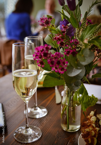Champagne and flowers in a restaurant