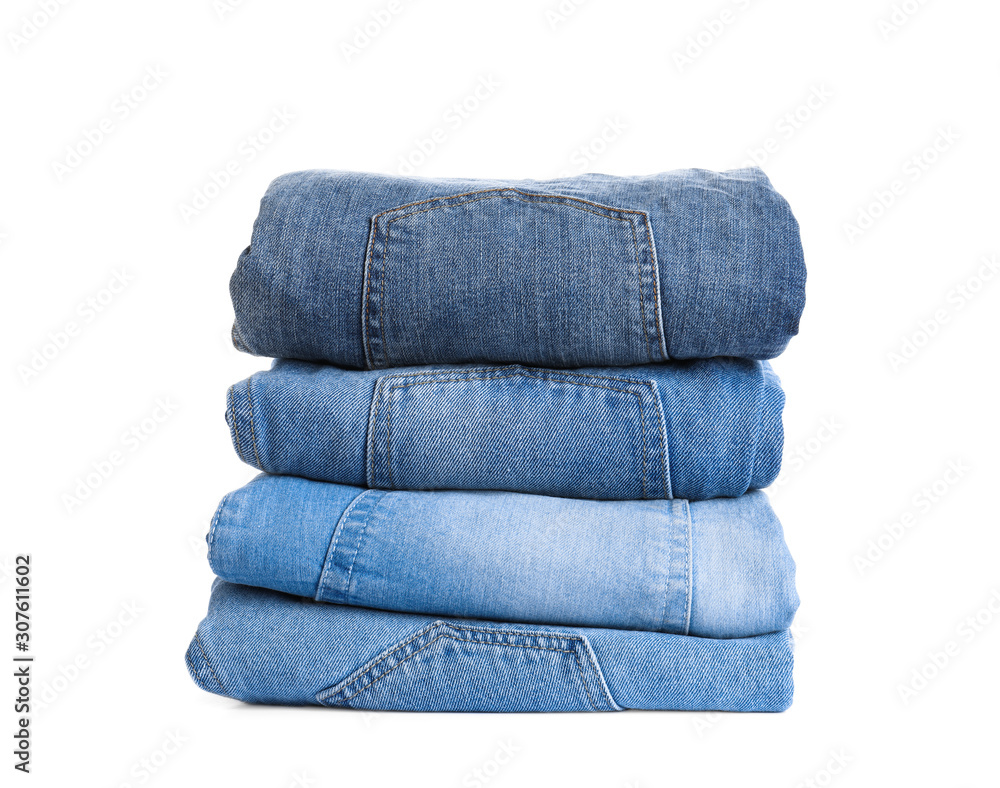 Stack of different jeans isolated on white Stack of different jeans isolated on white