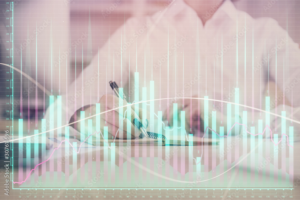 Financial chart drawn over hands taking notes background. Concept of research. Multi exposure Financial chart drawn over hands taking notes background. Concept of research. Multi exposure