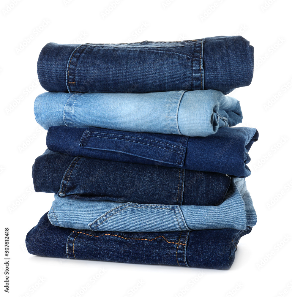 Stack of different jeans isolated on white Stack of different jeans isolated on white