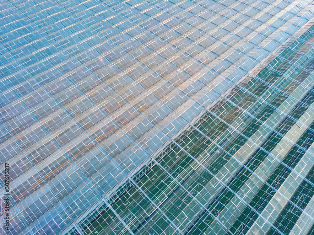 aerial view of a modern agricultural greenhouse in the Netherlands that uses artificial light to support the growth of the plants; Westland, Netherlands aerial view of a modern agricultural greenhouse in the Netherlands that uses artificial light to support the growth of the plants; Westland, Netherlands