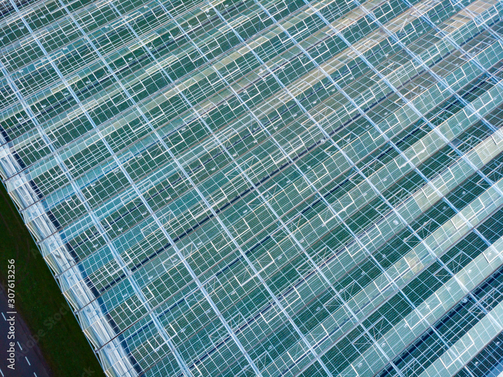 aerial view of a modern agricultural greenhouse in the Netherlands that uses artificial light to support the growth of the plants; Westland, Netherlands aerial view of a modern agricultural greenhouse in the Netherlands that uses artificial light to support the growth of the plants; Westland, Netherlands