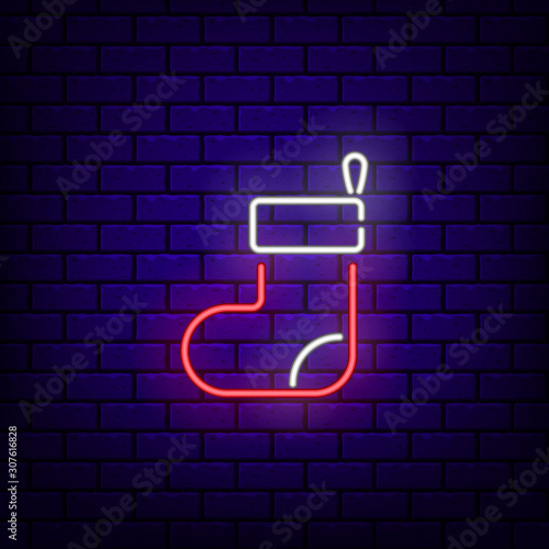 Neon Christmas stocking icon. Neon glowing symbol for new year and Christmas projects, greeting cards, banners, flyers. Bright sign.