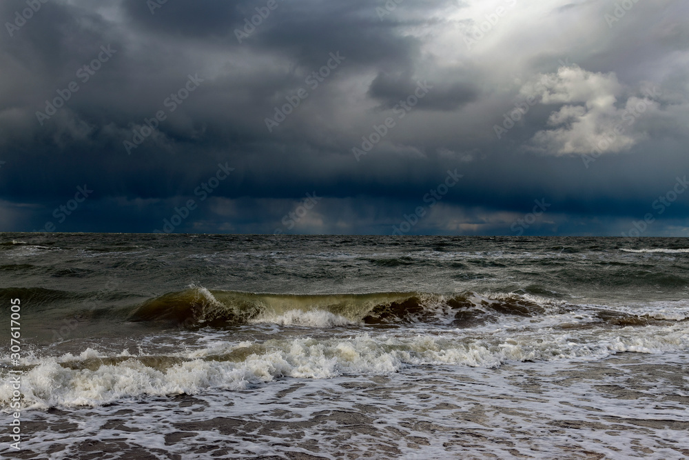 Dark clouds above stormy Baltic sea.
