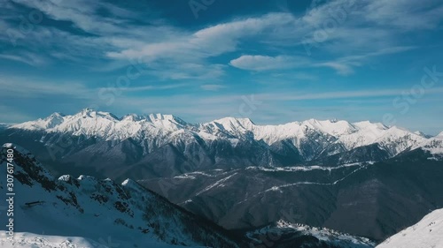 Wallpaper Mural Rising up aerial shot lonely active snowboarder sportsman climbing on top of high mountain surrounded by snow. Backpacker hiker tourist enjoying travel at amazing winter landscape Torontodigital.ca