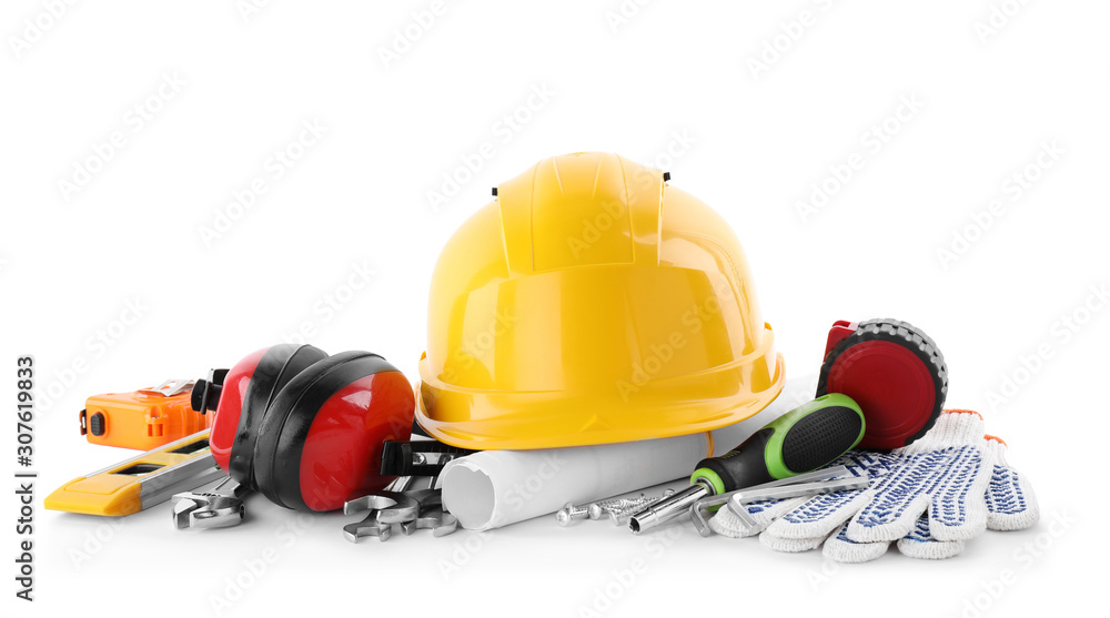 Different construction tools and hard hat isolated on white