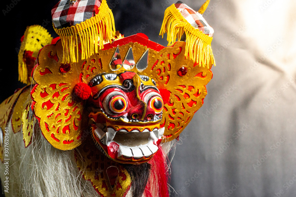 colorful replica barong bali with a black background
