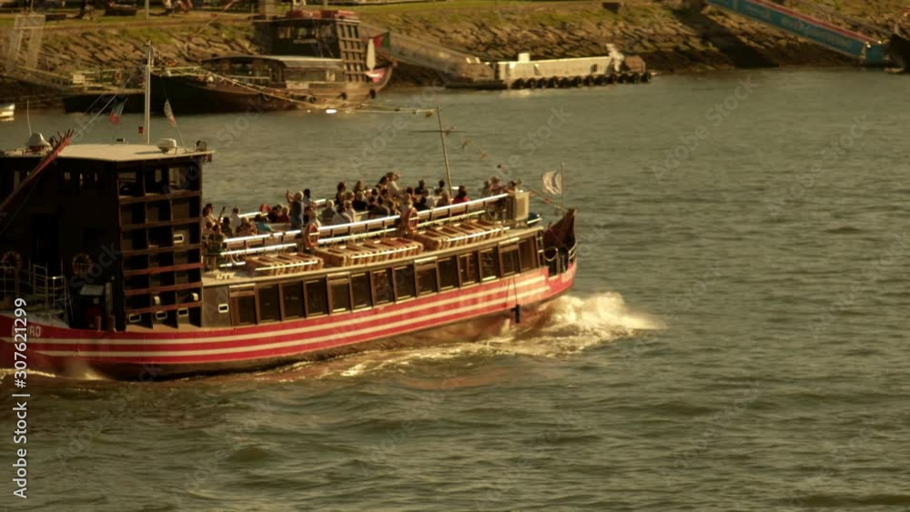 Rabelo style tourist boat on the Douro River in Porto Portugal. Rabelo style tourist boat on the Douro River in Porto Portugal.