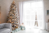 Beautiful interior of living room with decorated Christmas trees