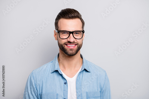 Closeup photo of amazing friendly business guy perfect neat appearance hairstyle young promoted boss chief wear specs casual denim outfit isolated grey color background