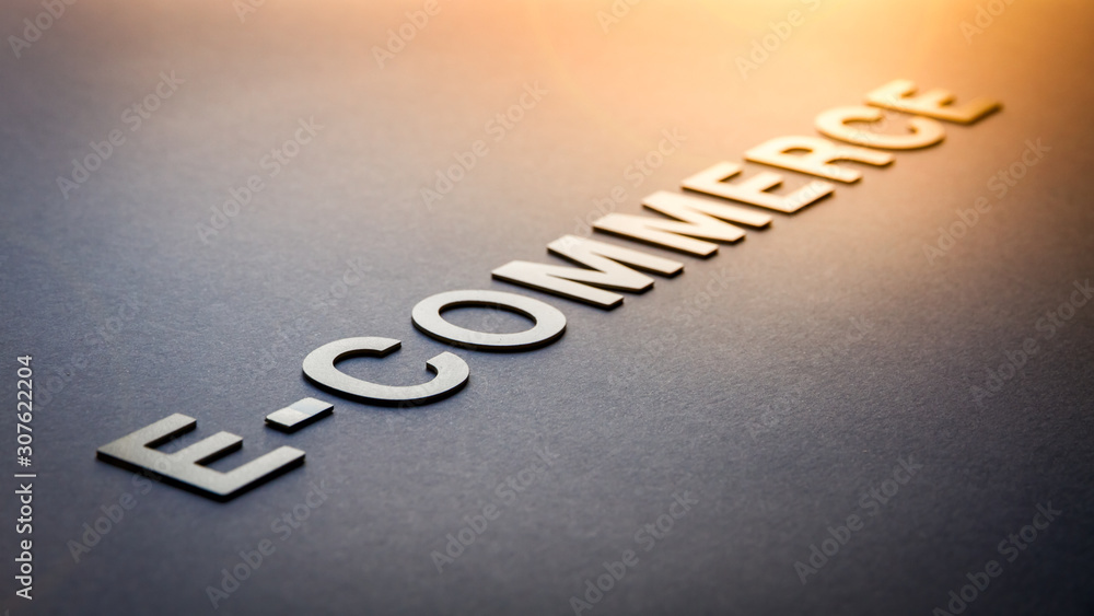Fototapeta premium Word e-commerce written with white solid letters