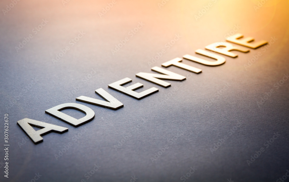 Fototapeta premium Word adventure written with white solid letters