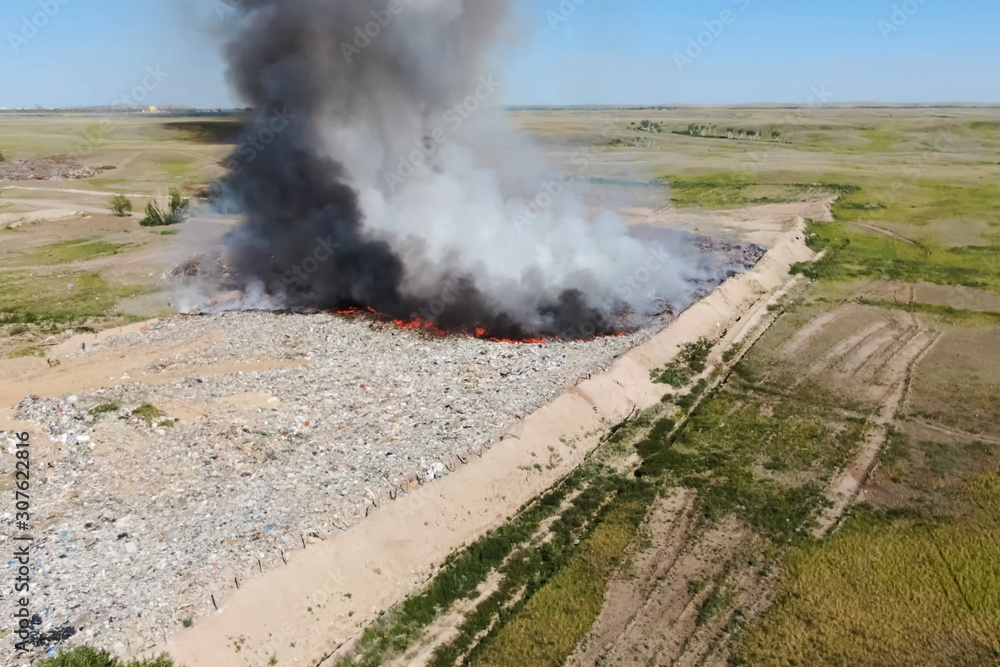 Burning trash. fire at the landfill. Burning garbage. Burning trash. fire at the landfill. Burning garbage.