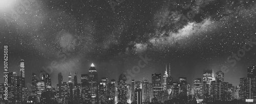 Panoramic night skyline of Midtown Manhattan on a starry night, New York City, USA