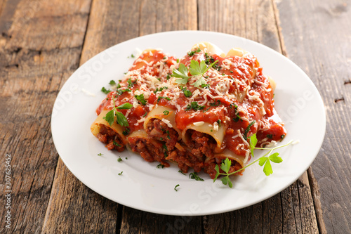 cannelloni with minced beef and tomato sauce