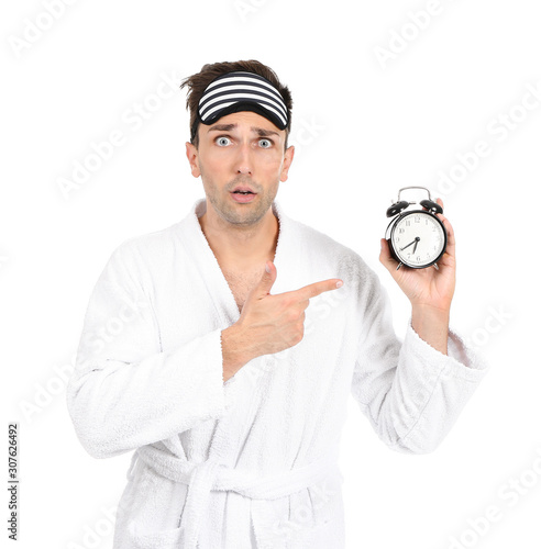 Surprised man in bathrobe, ...