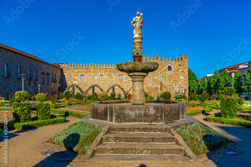 Archbishop palace viewed through gardens of Santa Barbara in Braga, Portugal photo
