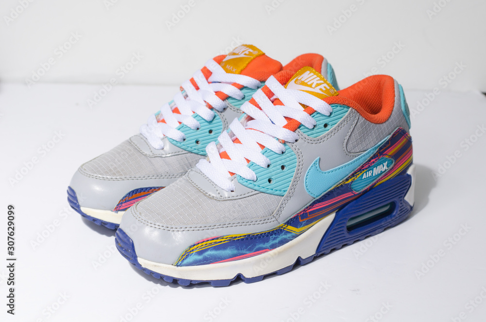 london, englabnd, 05/08/2018 Nike Air Max 90 Grey Clearwater Gold LIMITED EDITION. Nike air max retro classic sneaker trainers. sport and street wear fashionable athletic apparel. Isolated nikes. Stock Photo | Adobe Stock