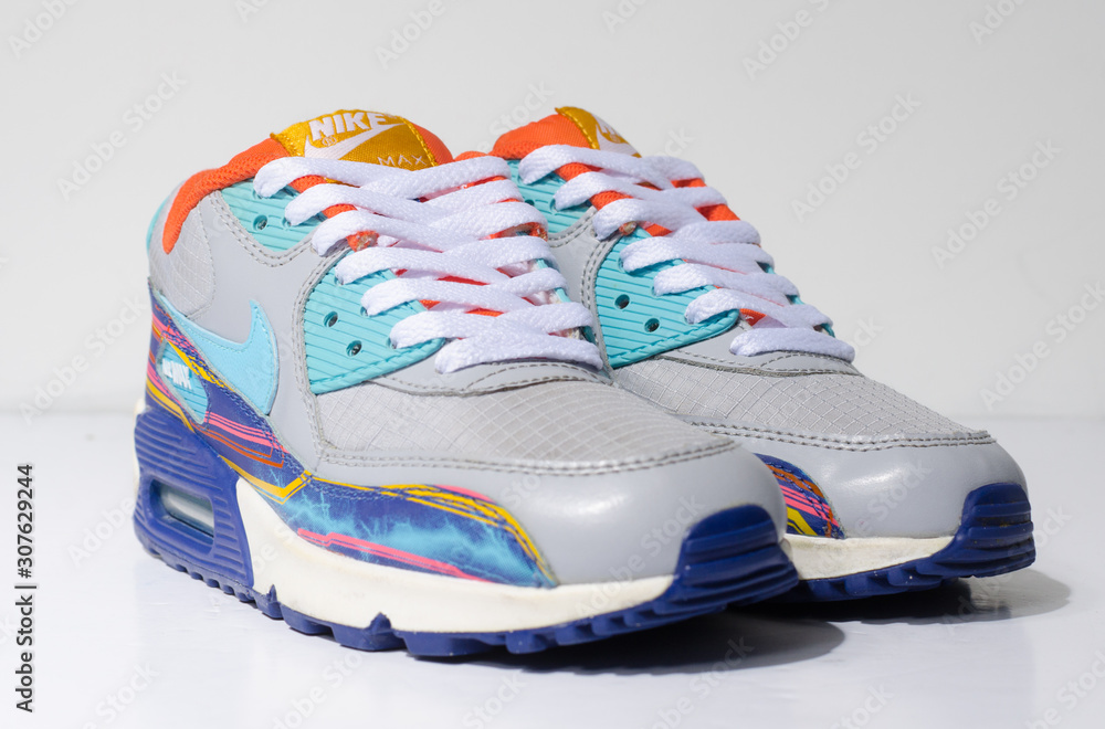 london, englabnd, 05/08/2018 Nike Air Max 90 Grey Clearwater Gold LIMITED  EDITION. Nike air max retro classic sneaker trainers. Nike sport and street  wear fashionable athletic apparel. Isolated nikes. Stock 写真 | Adobe Stock