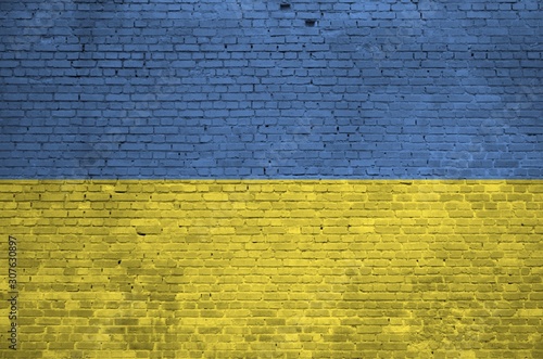 Photography Ukraine flag depicted in paint colors on old brick wall