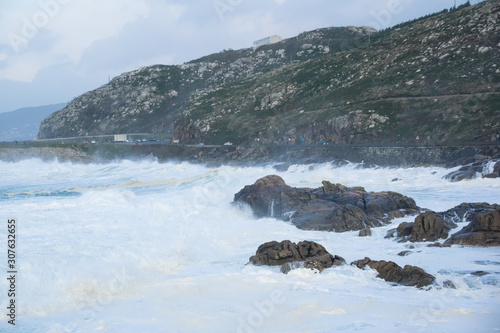 Waves crashing into the coast of Galicia after a stormy day