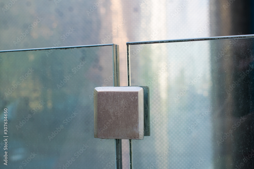 Tempered glass railing clamp. Glass to glass connection bracket. Stock ...