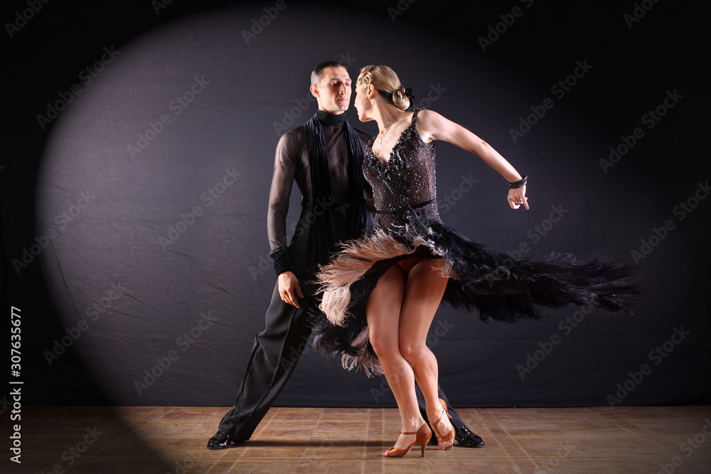 dancers in ballroom isolated on black background dancers in ballroom isolated on black background