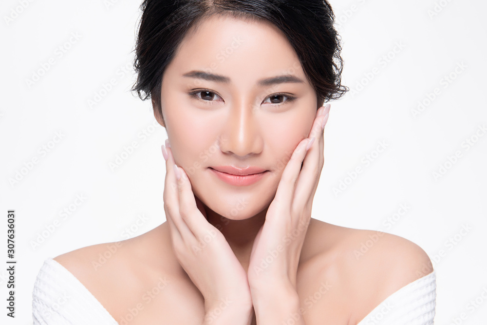 Beautiful Young Asian Woman with Clean Fresh Skin. Face care, Facial treatment, on white background, Beauty and Cosmetics Concept. Beautiful Young Asian Woman with Clean Fresh Skin. Face care, Facial treatment, on white background, Beauty and Cosmetics Concept.