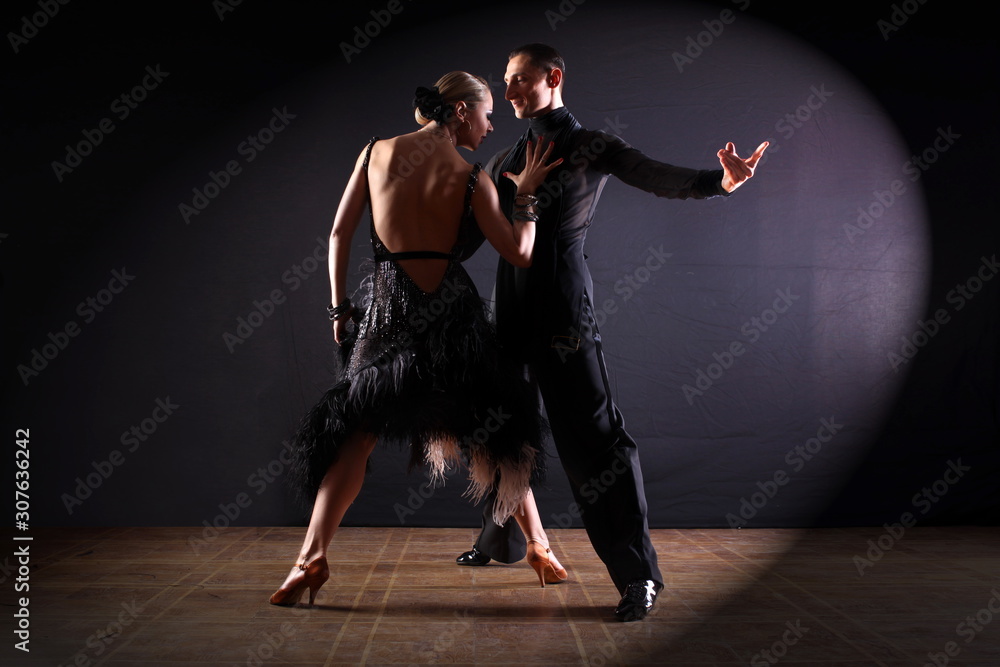 Dancers in ballroom isolated on black background Dancers in ballroom isolated on black background