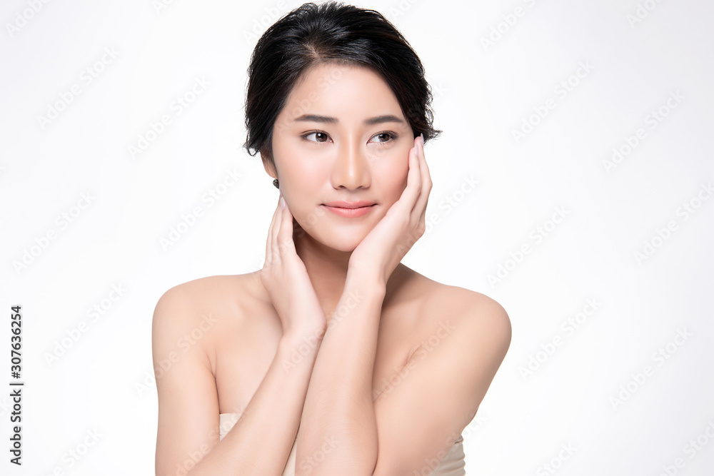 Beautiful Young Asian Woman with Clean Fresh Skin. Face care, Facial treatment, on white background, Beauty and Cosmetics Concept. Beautiful Young Asian Woman with Clean Fresh Skin. Face care, Facial treatment, on white background, Beauty and Cosmetics Concept.
