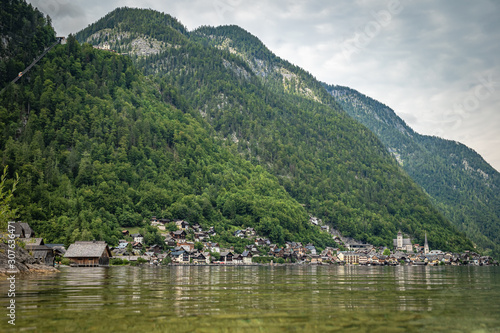 View on lake in austrian town hallstatt during tourist season in summer