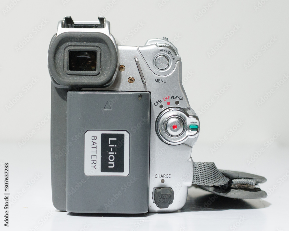 london, england, 05/05/2019 A samsung mini dv digital camcorder dig cam  recorder. SAMSUNG VP-D93 Mini DV/800 x Zoom LCD Digital Camcorder silver  isolated on white studio backdrop. Stock Photo | Adobe Stock