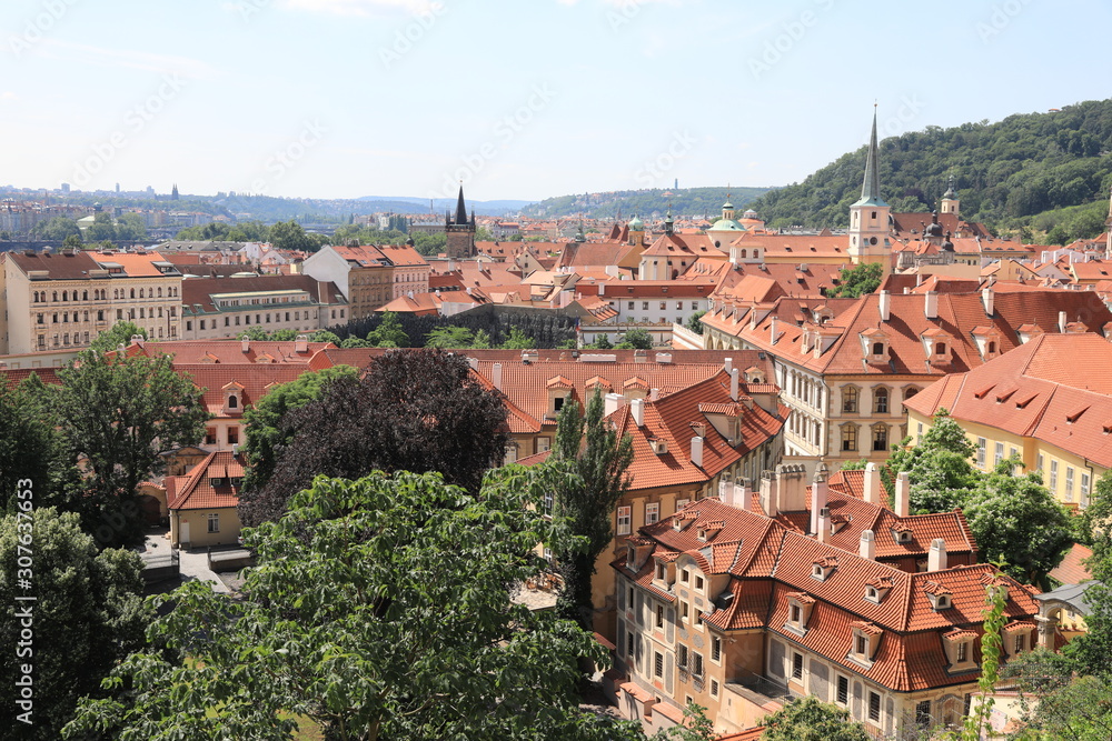 Classic Prague - aerial view to old roof buildings and street ,  Czech Republic