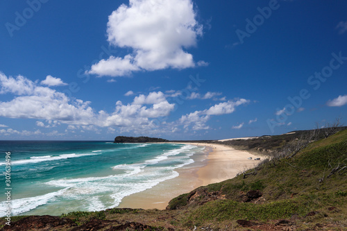 Long and emty beach on a summer day