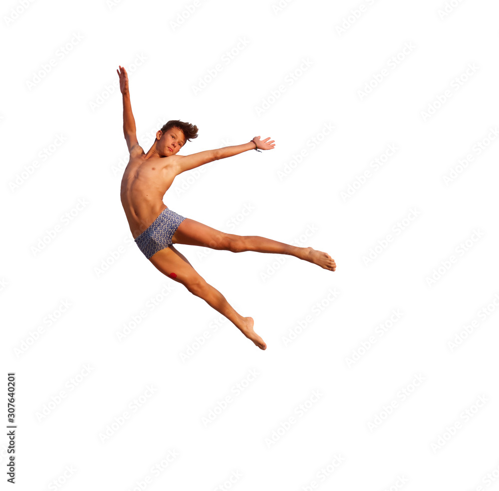 Fototapeta premium Athletic teenager in swimming trunks in a jump on a white background