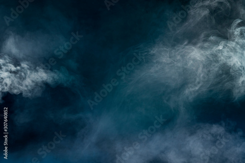 spectacular abstract white smoke isolated in color blue and green background