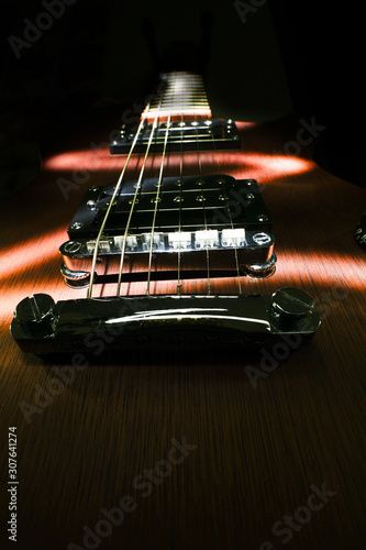 electric guitar on black background concept  
