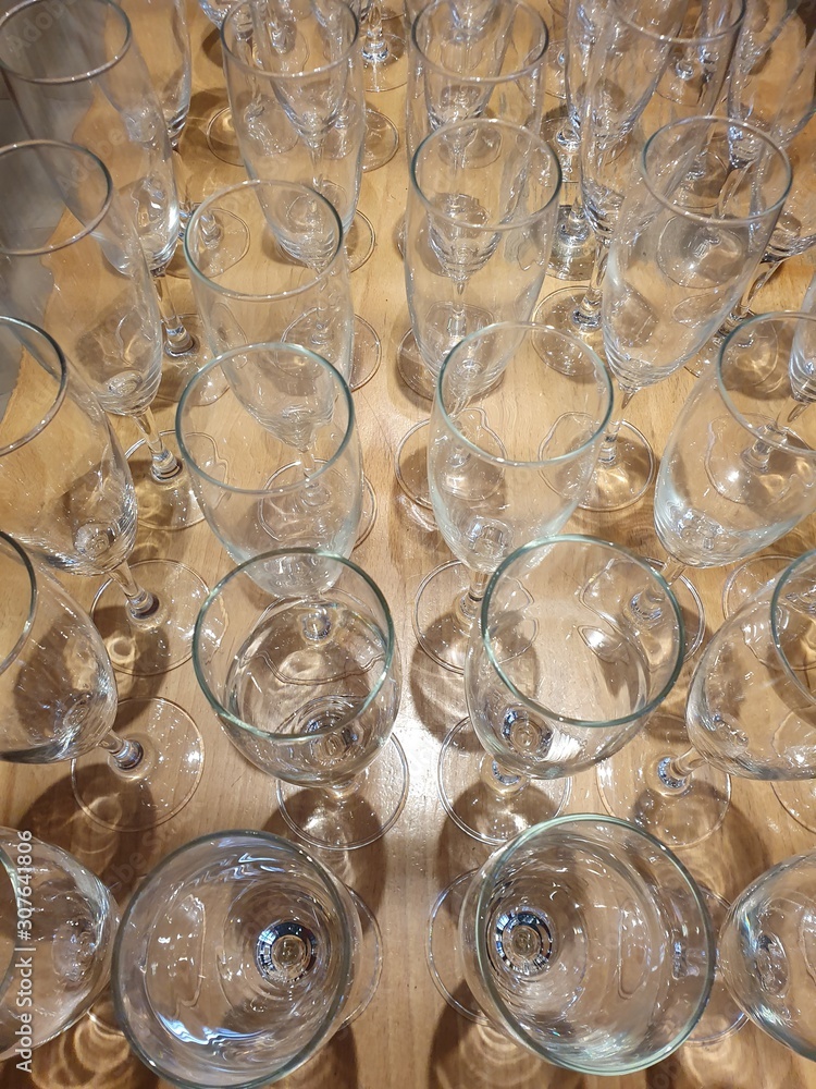 Some glasses on the table. Some glasses on the table.