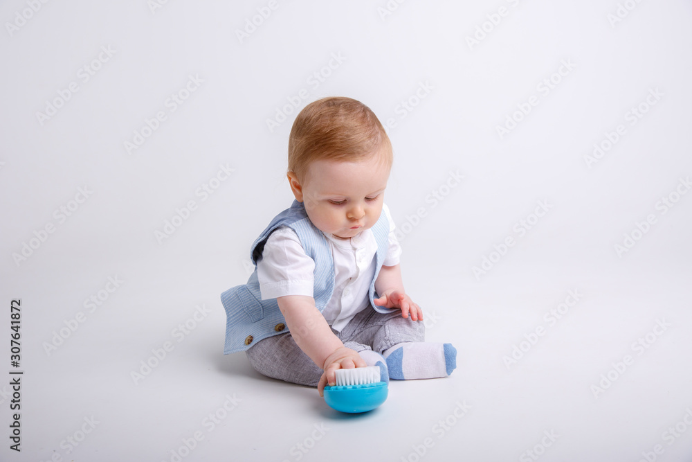 toddler with toy isolated on white background toddler with toy isolated on white background
