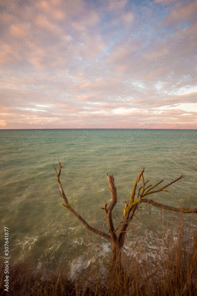 Sunset landscape on the beach at the sea