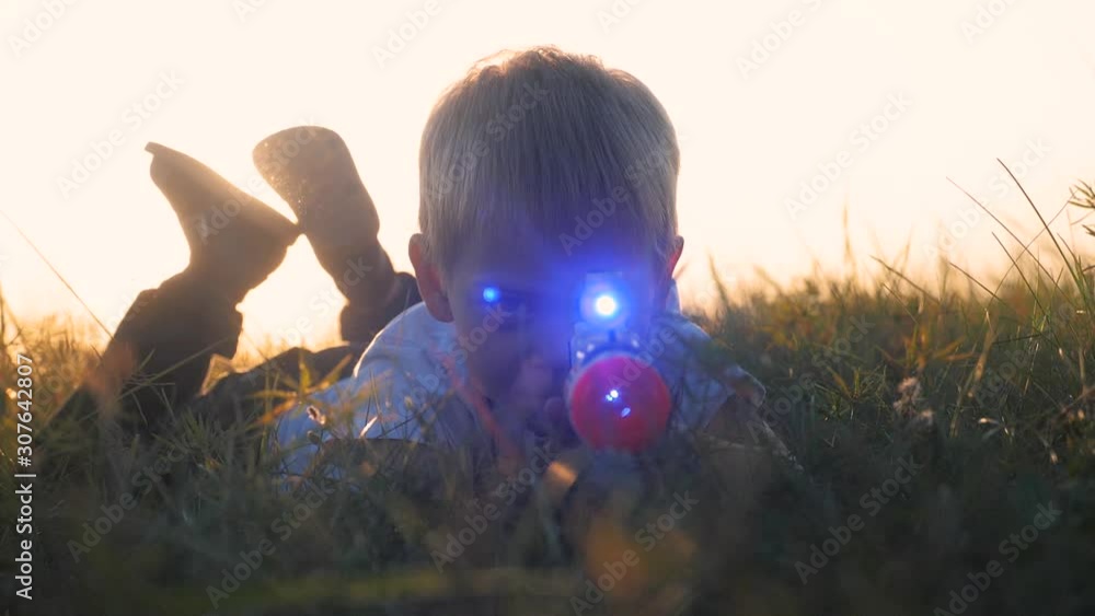 Dennis Shoots His Catapult, his signature toy/weapon, in silhouette main image 1
