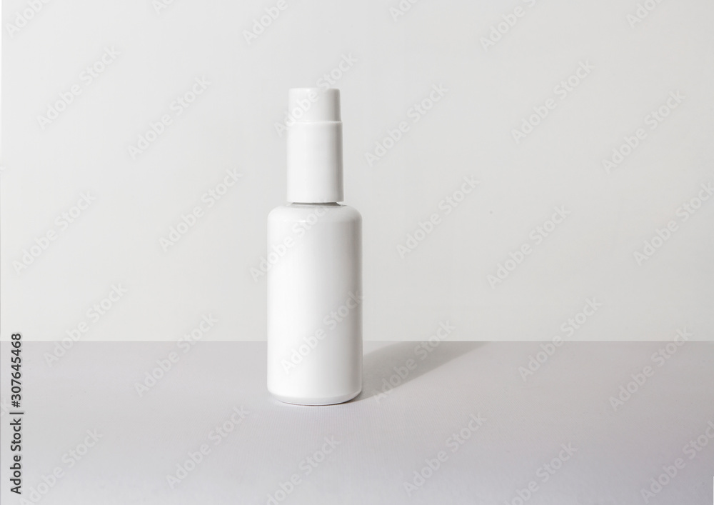 one white spray container for cosmetics one white spray container for cosmetics