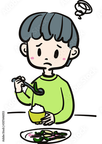 嫌いなものを食べる男の子のイラスト