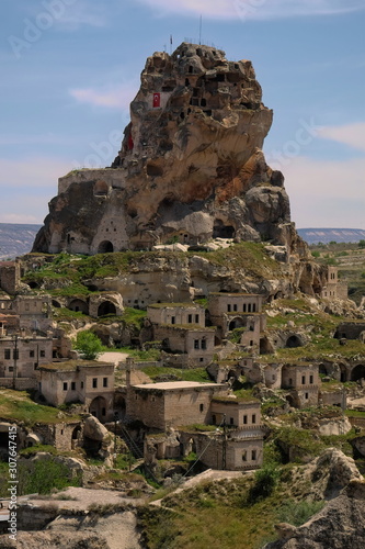 Thanks to the soft and easy shaping of the stones in the Cappadocia region, people built their own living spaces.Its places name Ortahisar Castle,in Turkey.