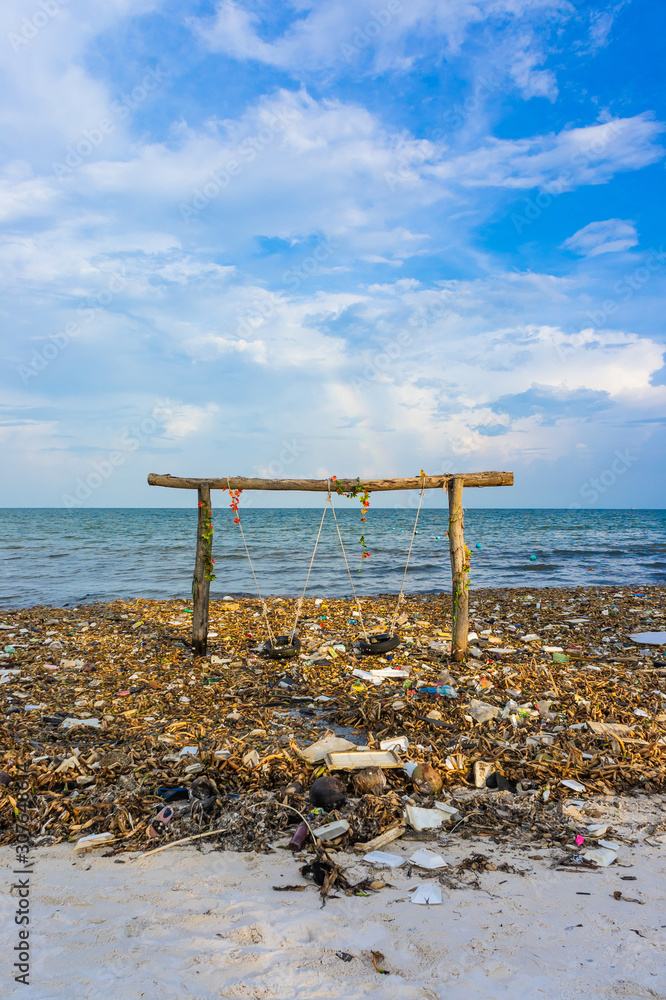 Environmental disaster. Garbage dump on Bai sao beach with white sand on the coastline. Phu Quoc island, Vietnam Environmental disaster. Garbage dump on Bai sao beach with white sand on the coastline. Phu Quoc island, Vietnam