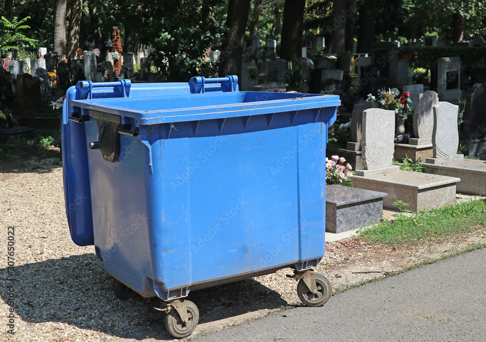 Garbage can in the public cemetery Garbage can in the public cemetery